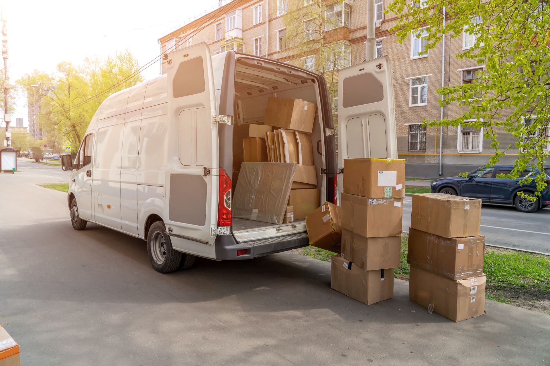 Van with cartons and boxes to be carried